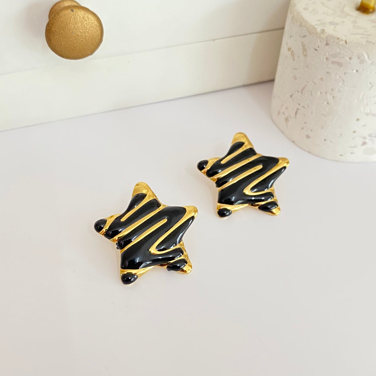 Aretes Estrella Negro acero