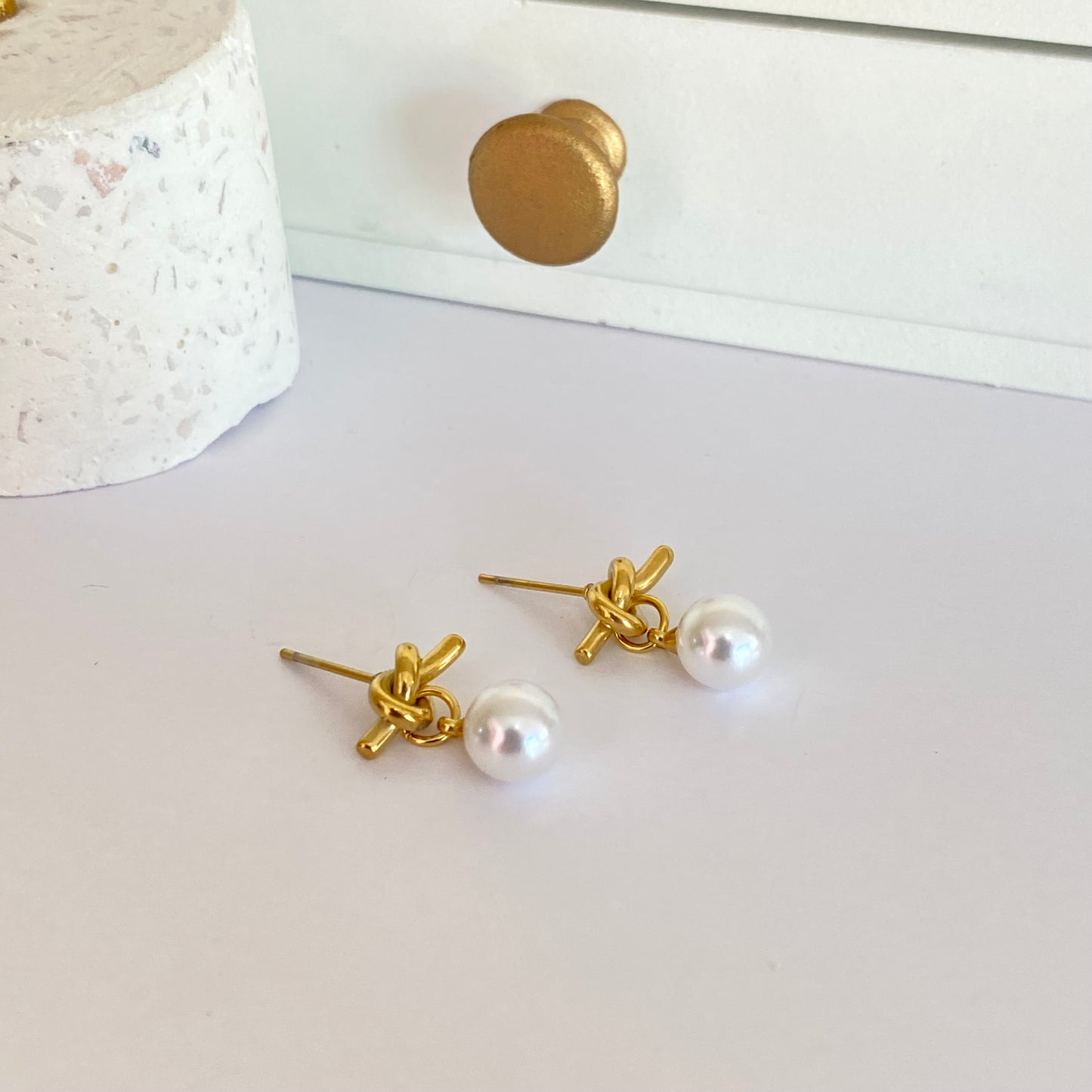 Arete nudo perla acero