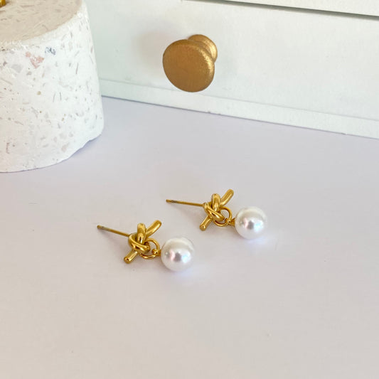 Arete nudo perla acero