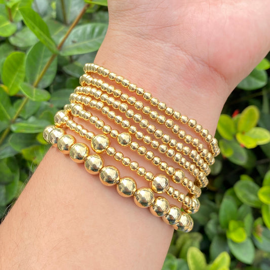 Pulseras doradas set/chapa
